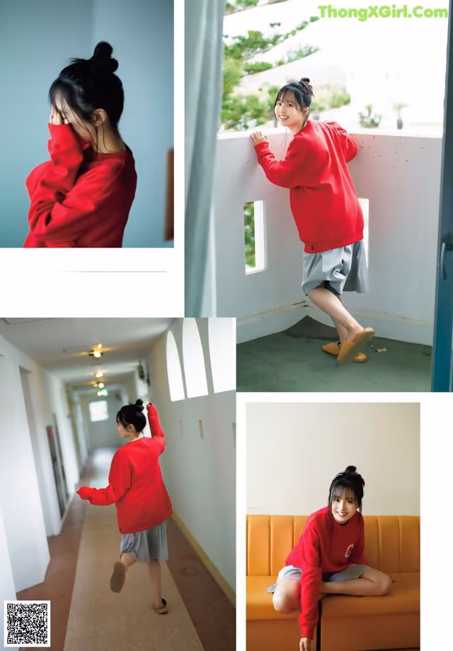A woman in a red sweatshirt and gray shorts is posing for a picture.