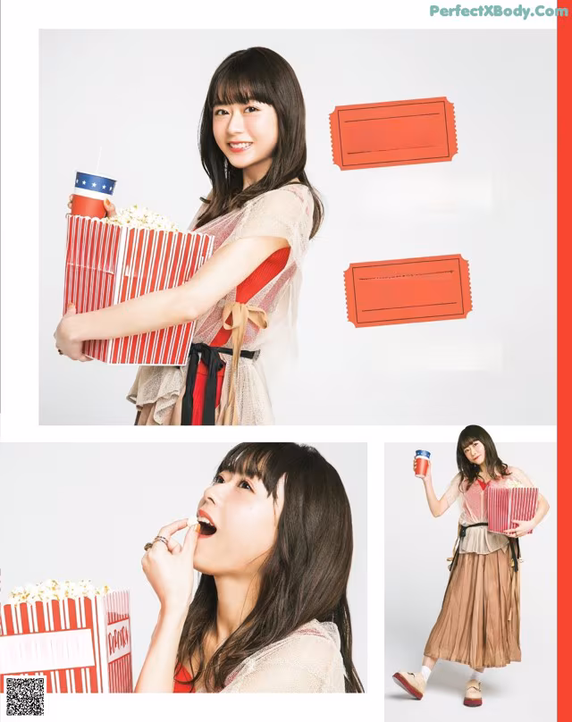 A woman holding a box of popcorn and a cup of coffee.
